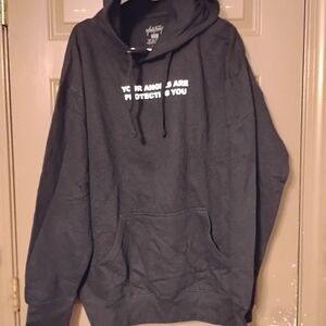 Stylish Black Hoodie with White Text by [Brand]